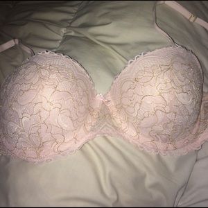 Pink and gold lacy bra