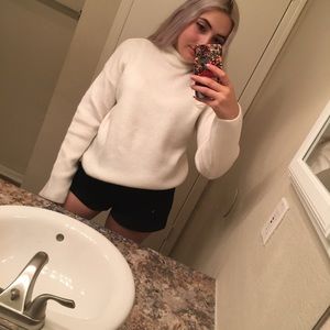 White turtle neck sweater