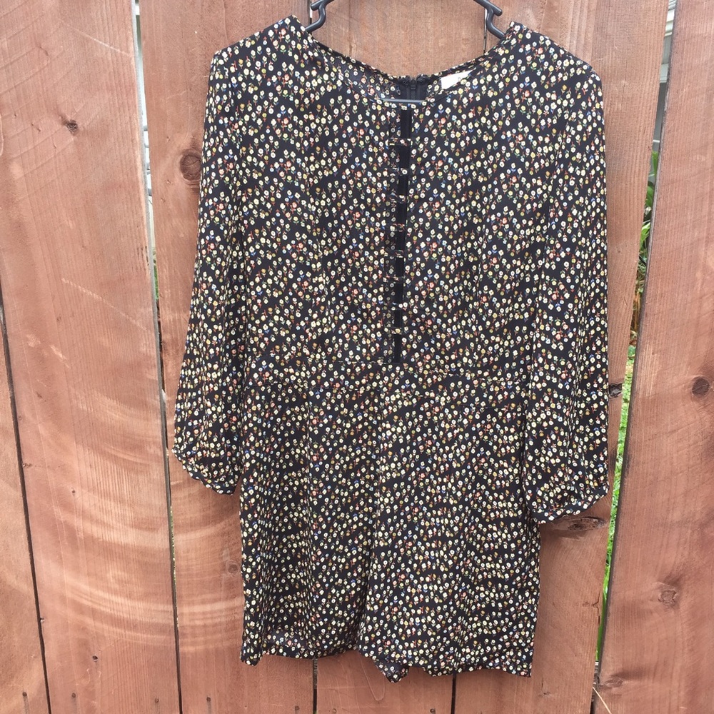 Black flowered romper with chest detail