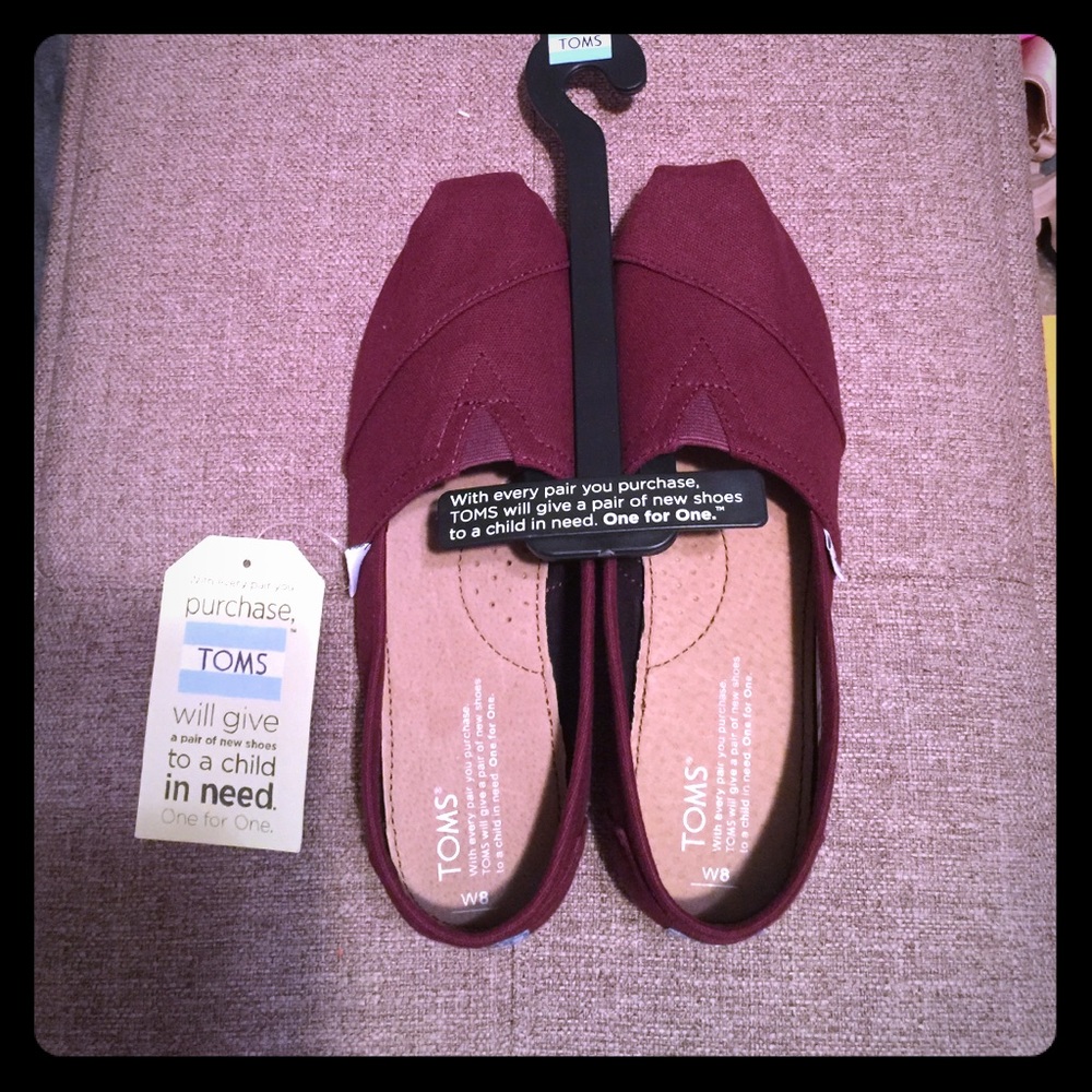 TOMS  slip ons size 8
