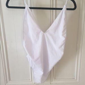 ZERACA ONE PIECE. NEVER WORN. BRAND NEW. MEDIUM