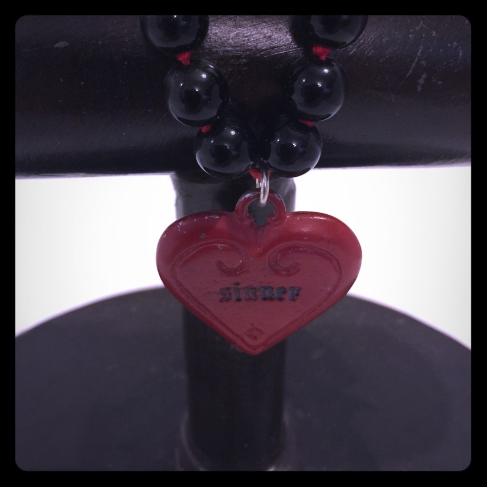 Sinner and Saint Necklace.