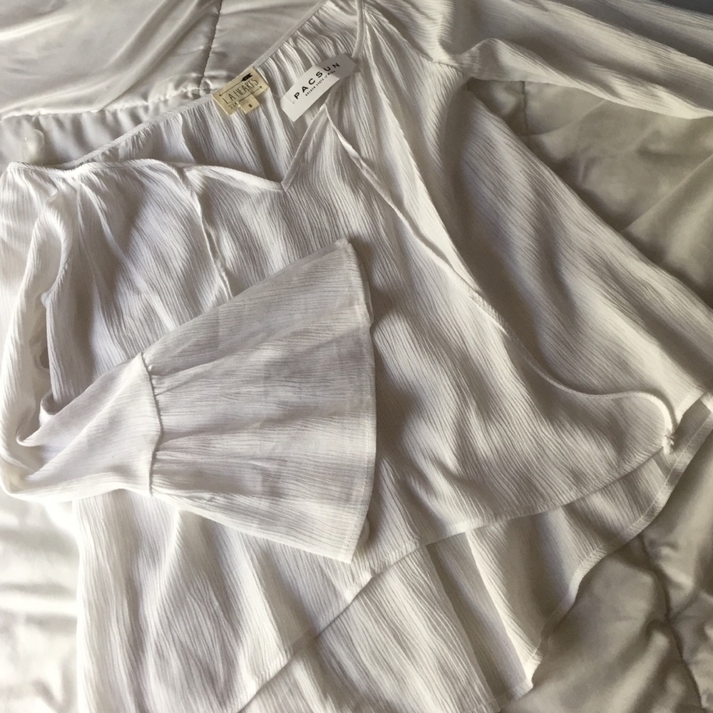 White flowy bell sleeve top