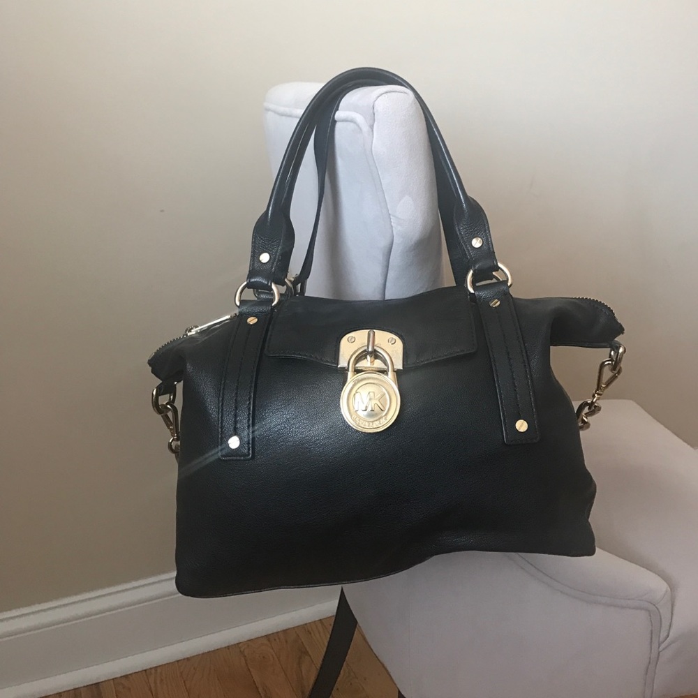 Black leather with gold detail Michael Kors purse