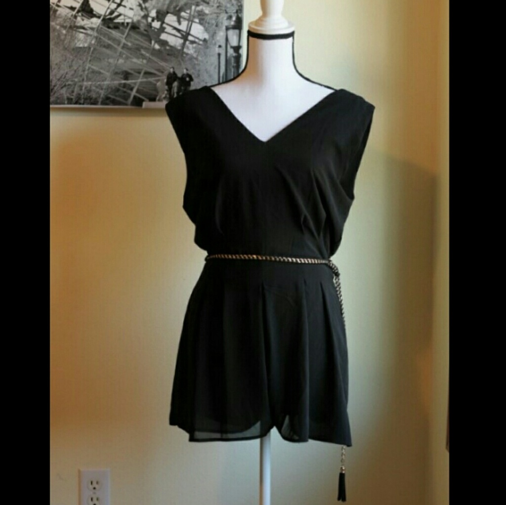 Like new! Elegant black romper