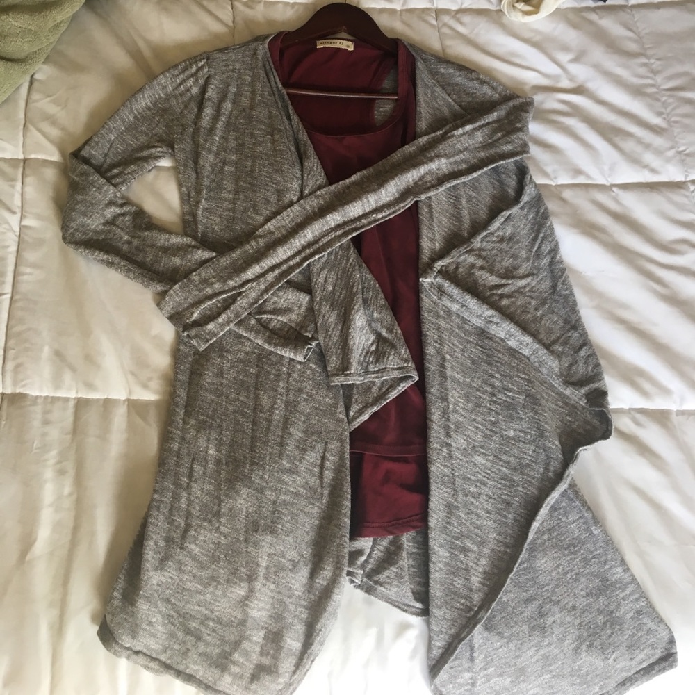 Grey long sleeve top.