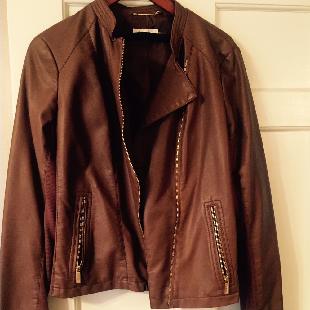 Caramel brown Calvin Klein leather jacket.
