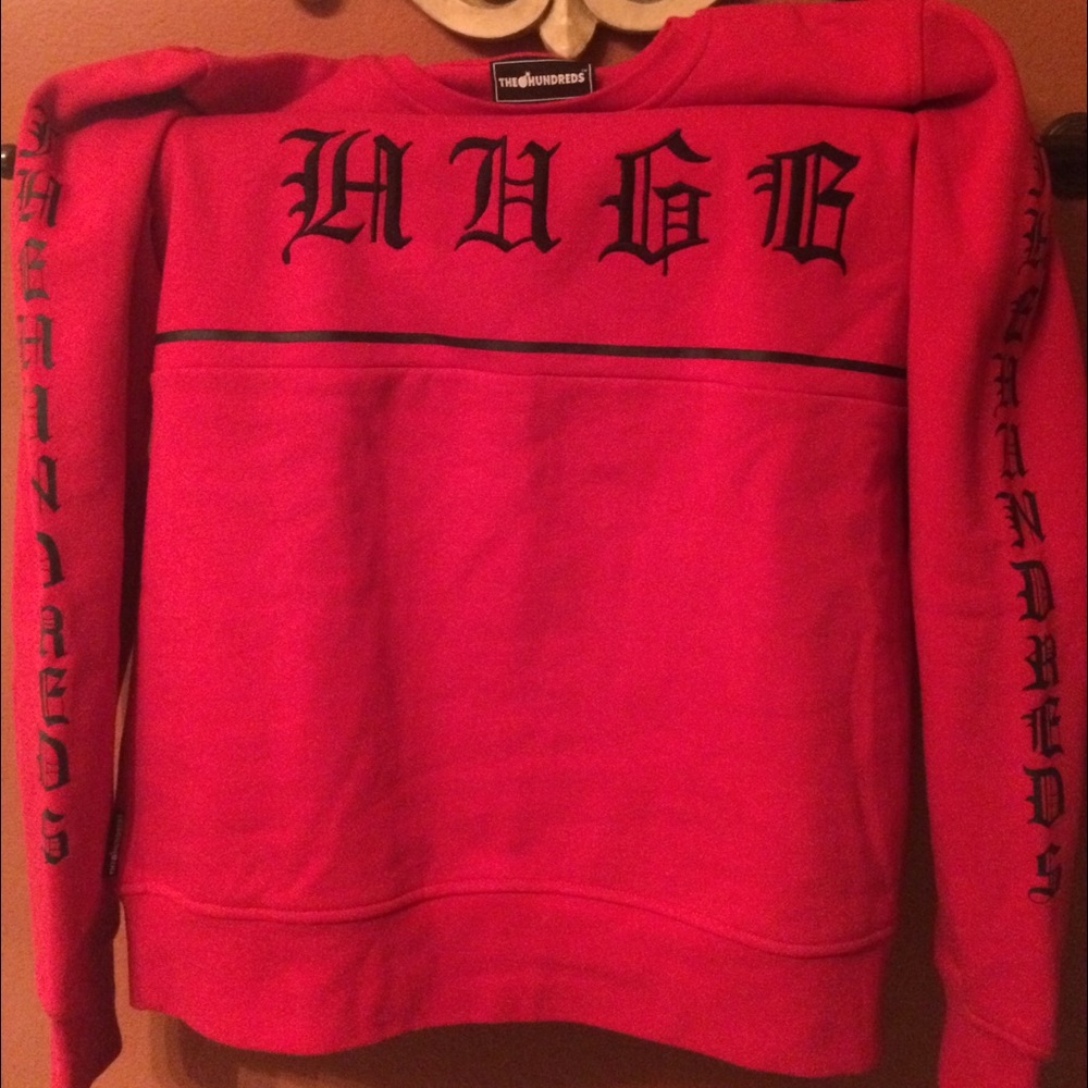 Red hundreds sweater