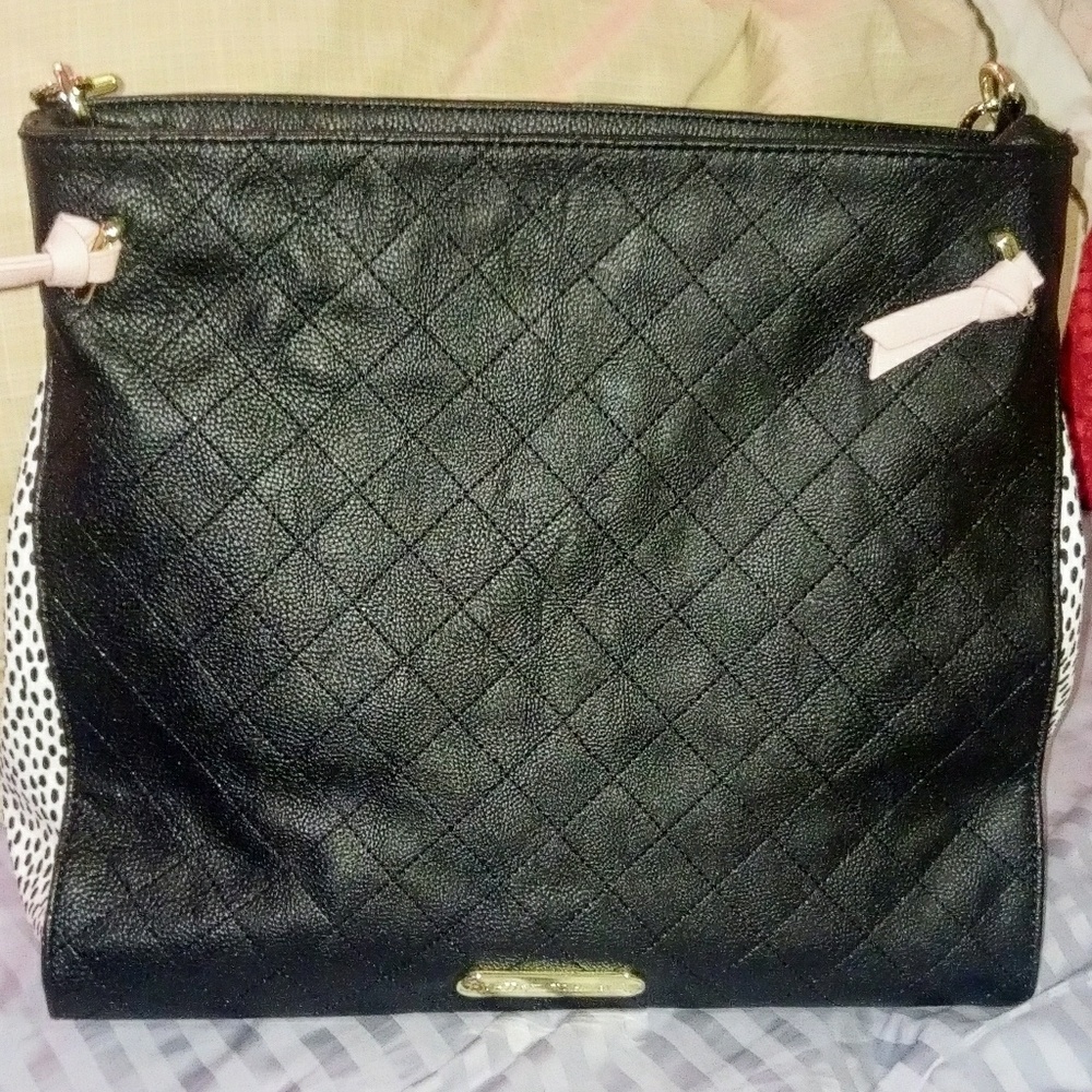 Black leather hand bag by Betsey Johnson