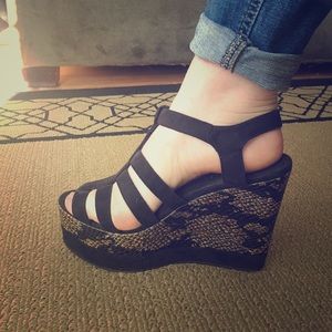 Black suede and faux snake skin wedges