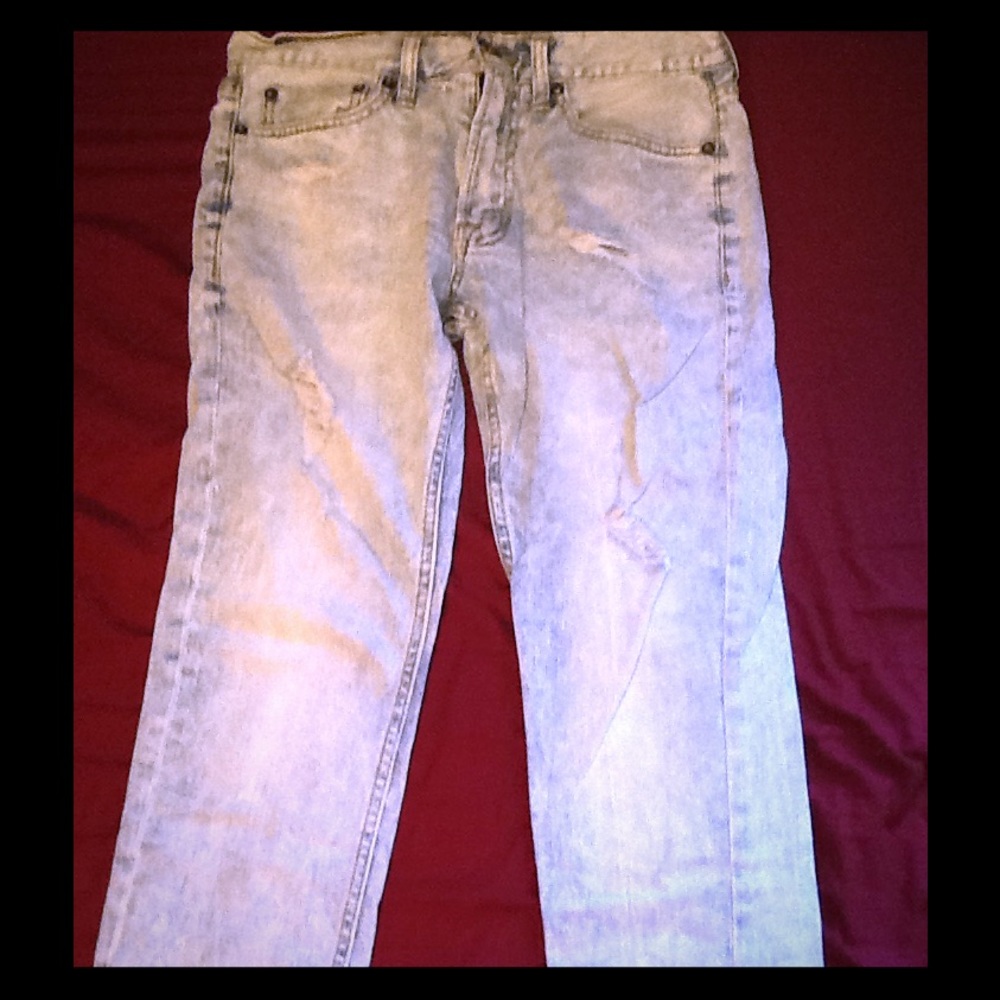 American Eagle light wash distressed jeans.