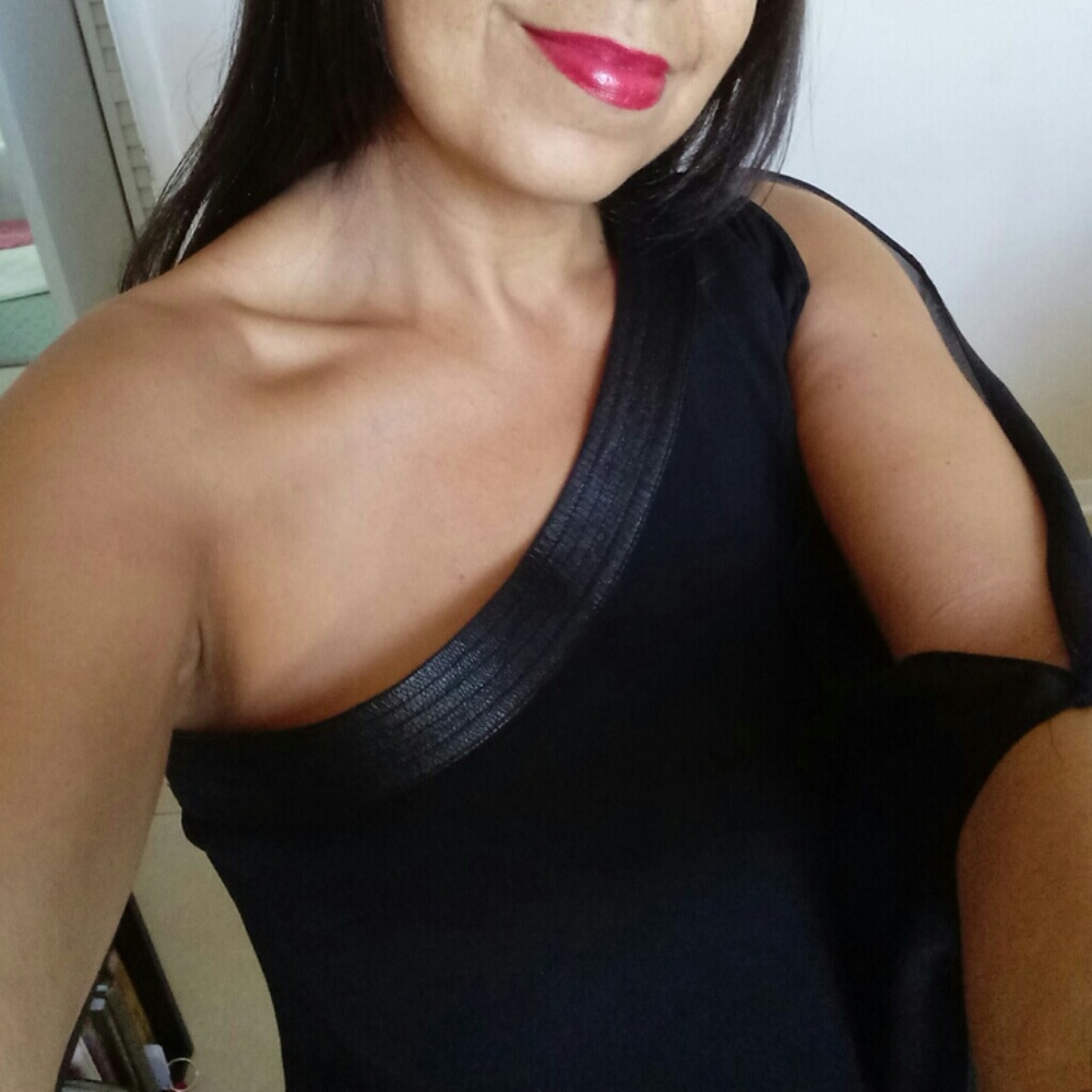 Very classy black blouse with leather rim