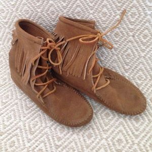 Fringed, lace up moccasins