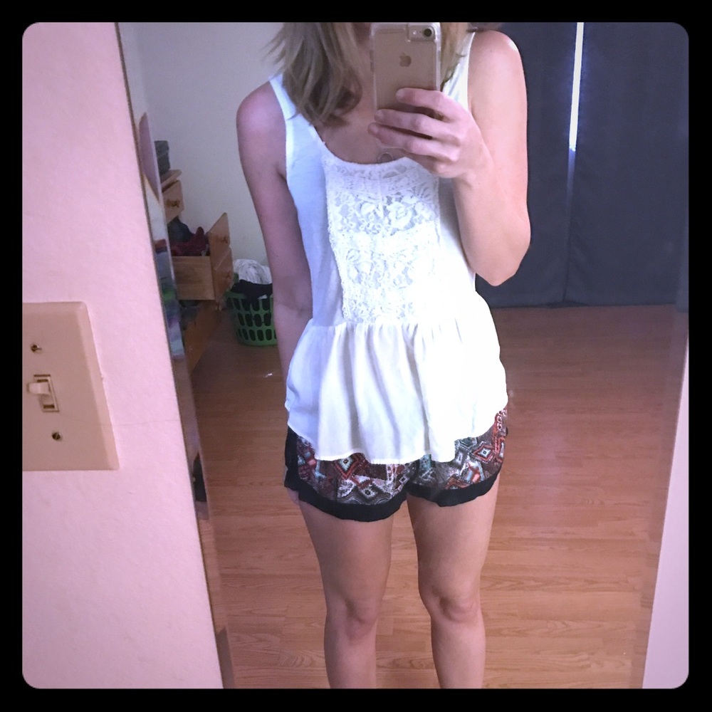 Peplum sleeveless top