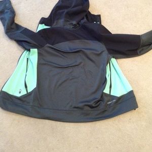 Green and black Nike jacket. Great in wind.