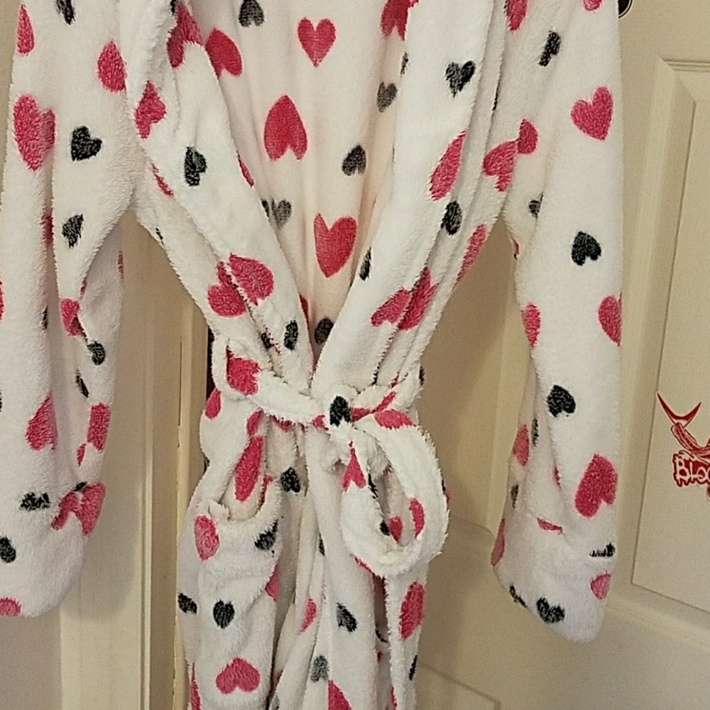 White with pink and black velour robe