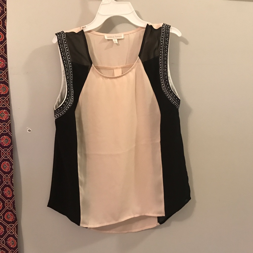 tan and black top with  bordering on sleeves