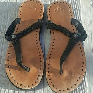 Black and tan leather UGGS