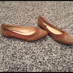Brown flats with gold details