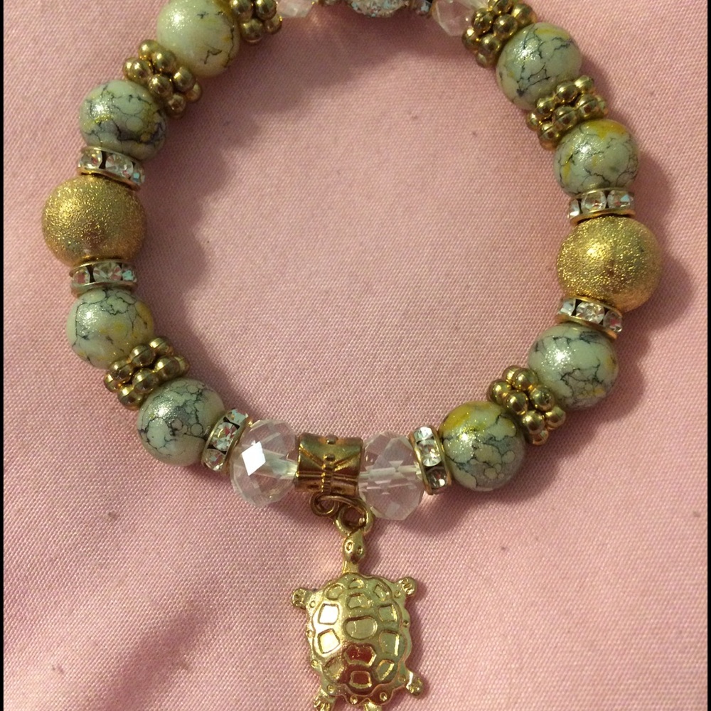 Stretch stone bracelet w/gold turtle charm