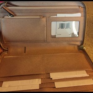 This is a beautiful Kate Spade wallet