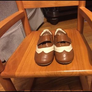 Size 6 shoes by the little captain worn only once!