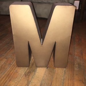 Decorative 'M' art