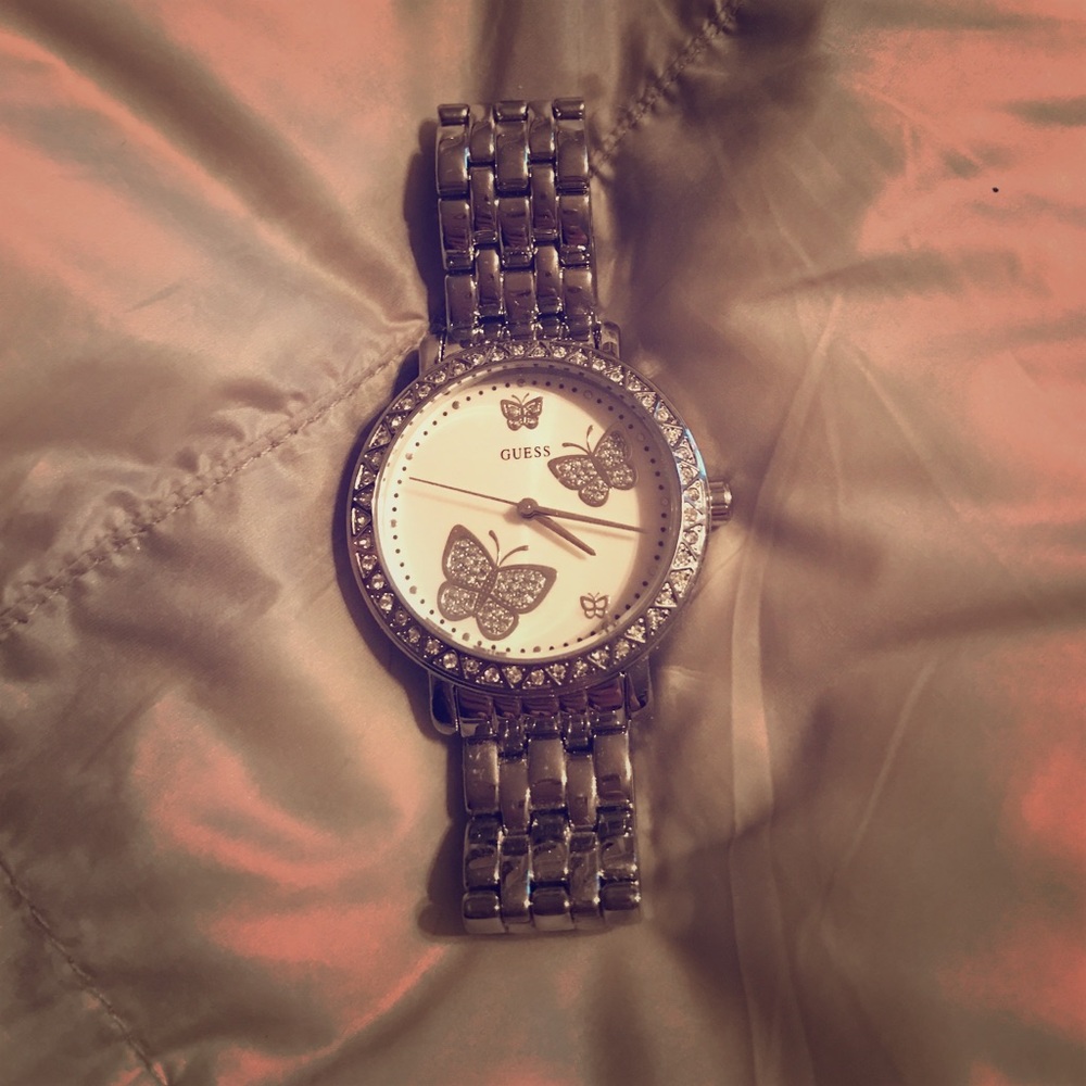 Guess silver watch, butterflies on the inside!