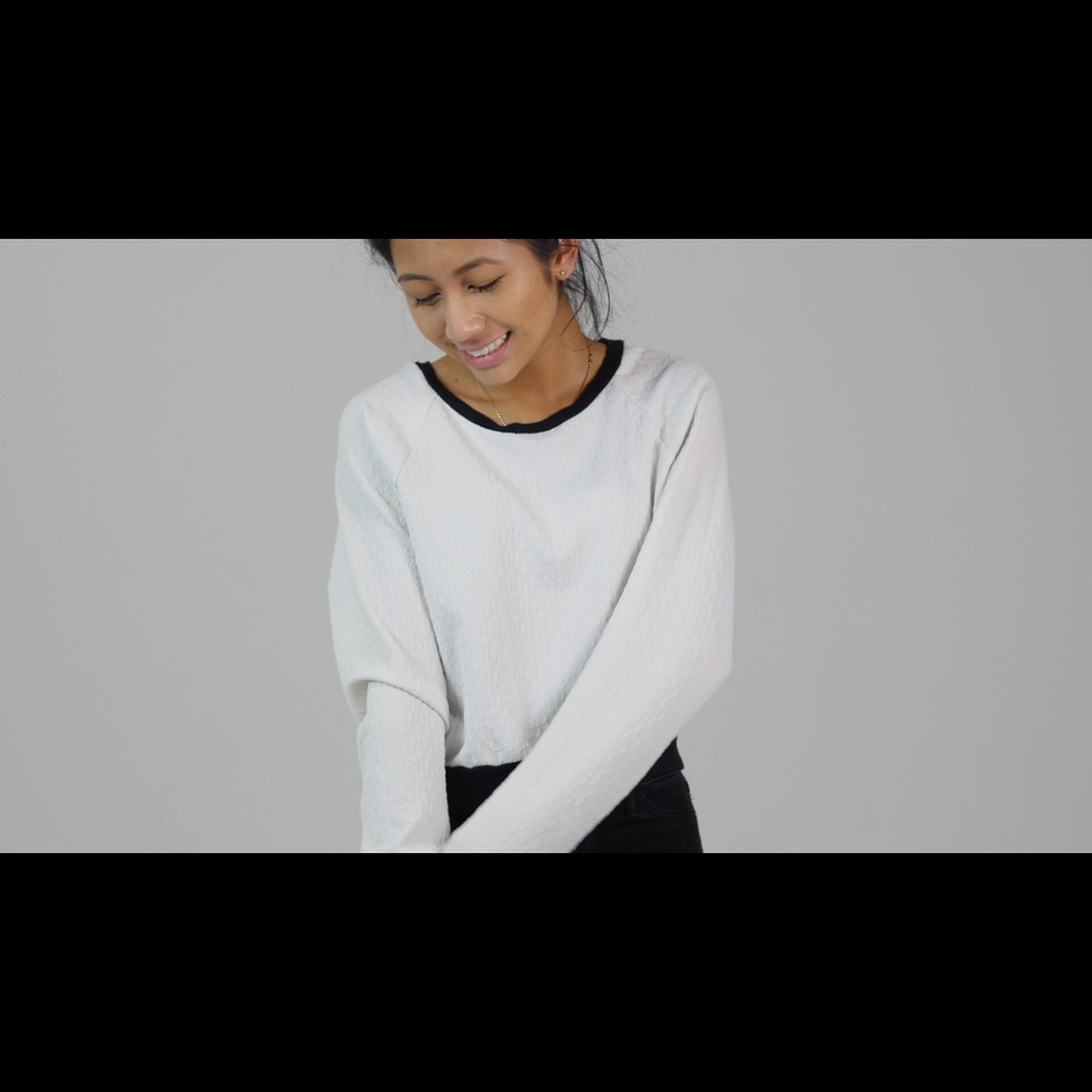 White textured sweater w/ black outlining