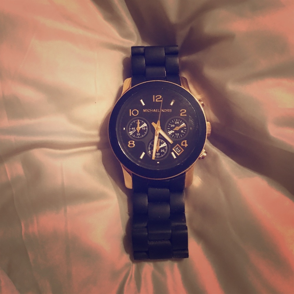 Womens black and gold watch. Michael Kors.