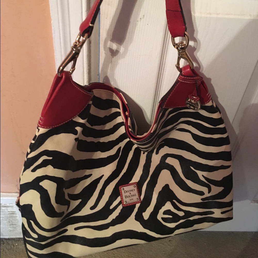 Vintage Zebra print Dooney bag trimmed in red