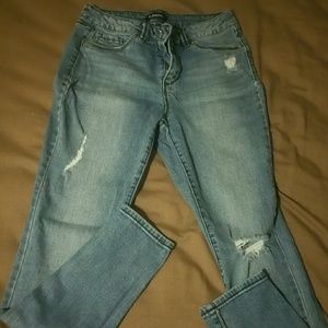 Distressed Slim Jeans