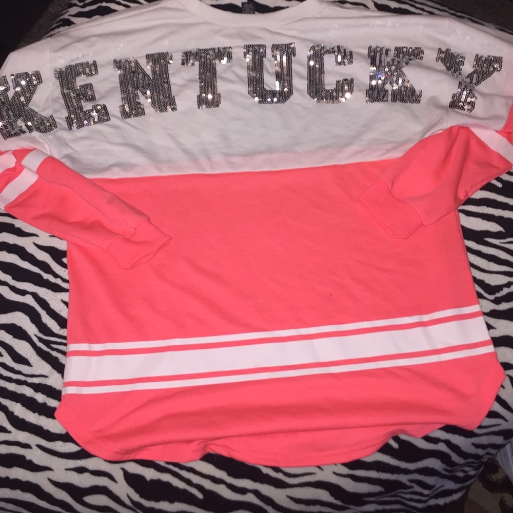 A pink and white jersey shirt.