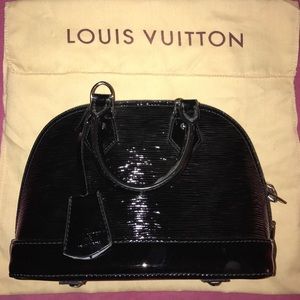 Louis Vuitton, never used