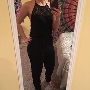 Black open back halter top jumpsuit