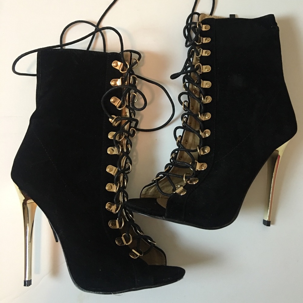 Black and gold lace up booties
