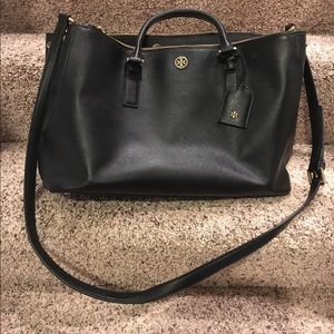 Classic Tory Burch handbag. Laptops fit in sides.