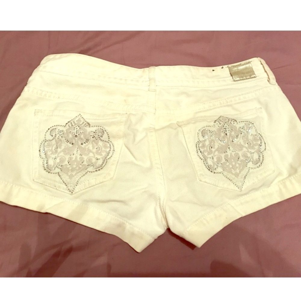 Short shorts with rhinestone design on pockets