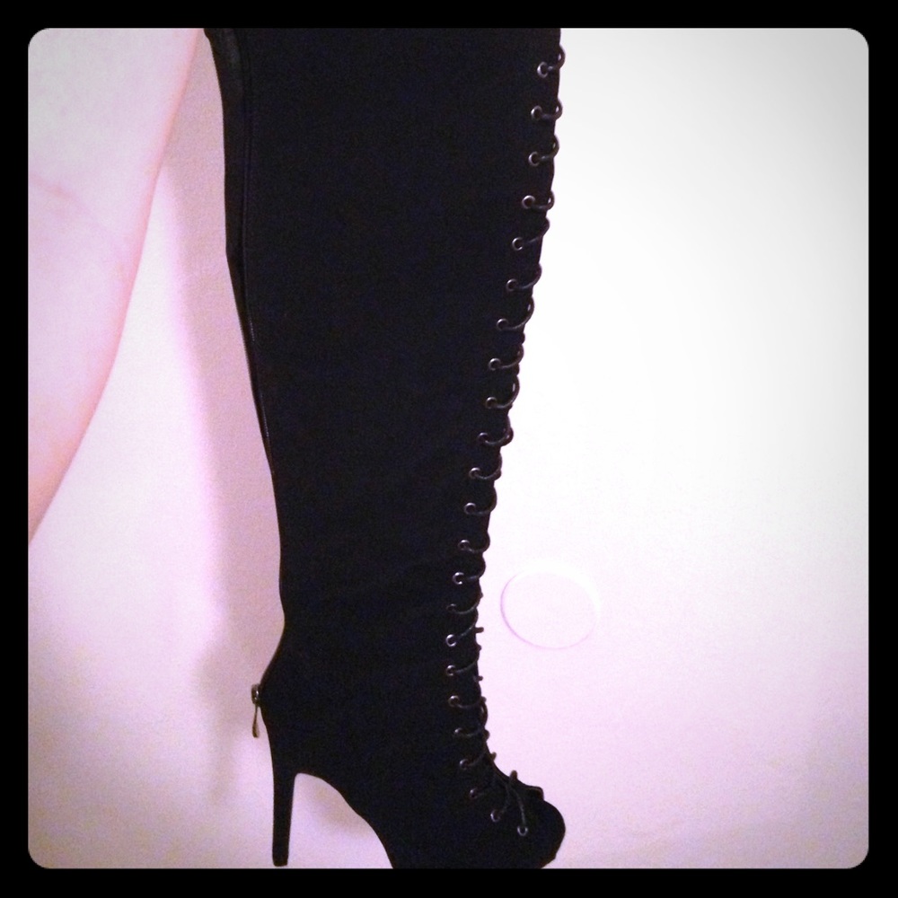 Thigh high lace up heel boots