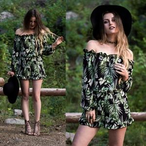 Black with green leaves romper