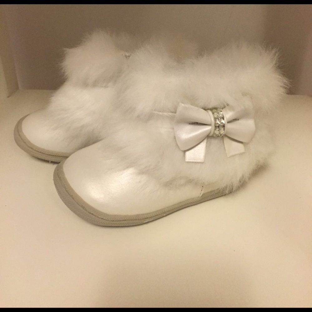 White faux fur boots