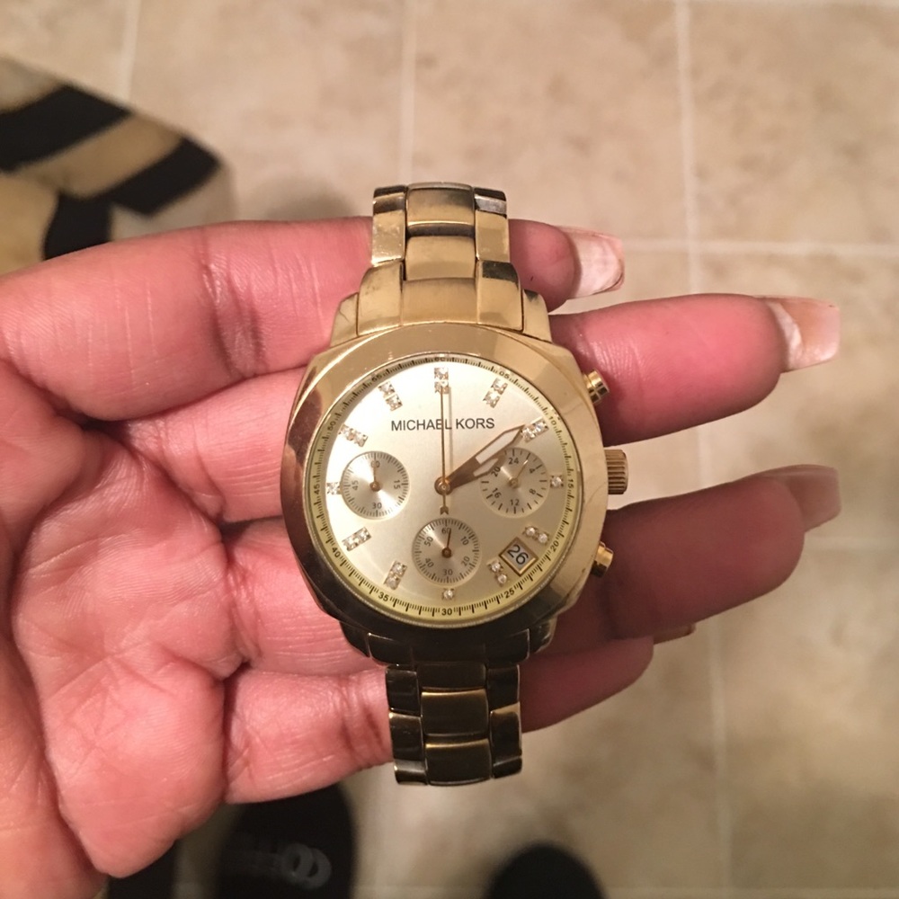 Michael Kors Gold watch.