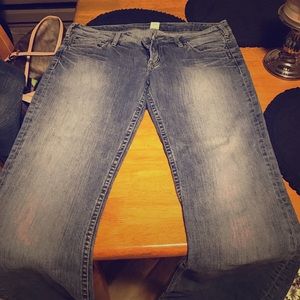 Silver bootcut jeans.