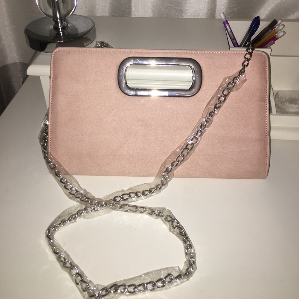 Clutch with chain for cross body. NEVER USED.