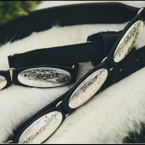 Silver buckle black concho western belt