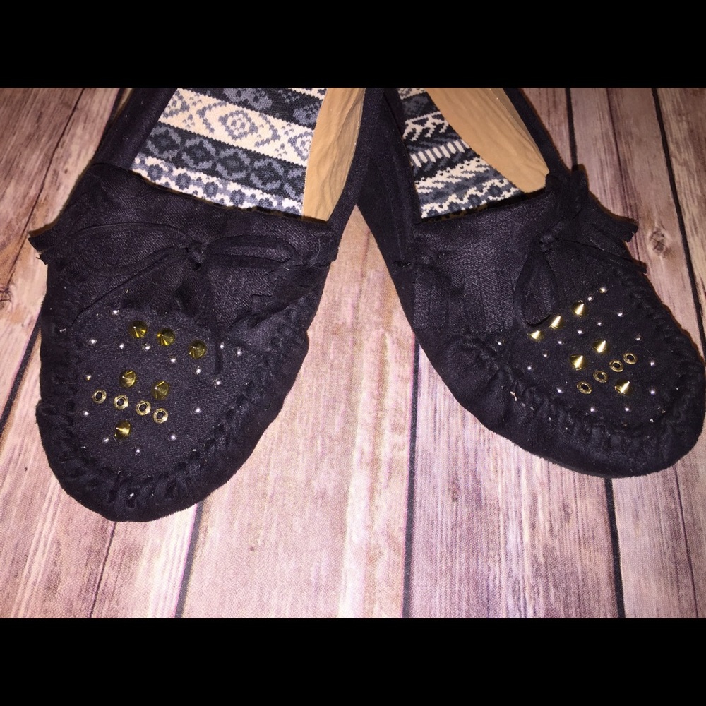 Black embellished moccasins