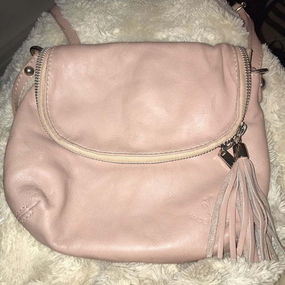 Genuine leather made it Italy small purse