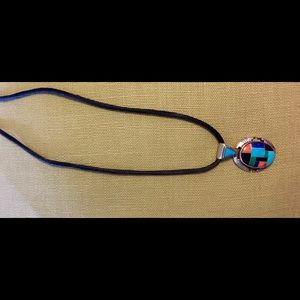 Sterling silver pendant on rope & SS bracelet.