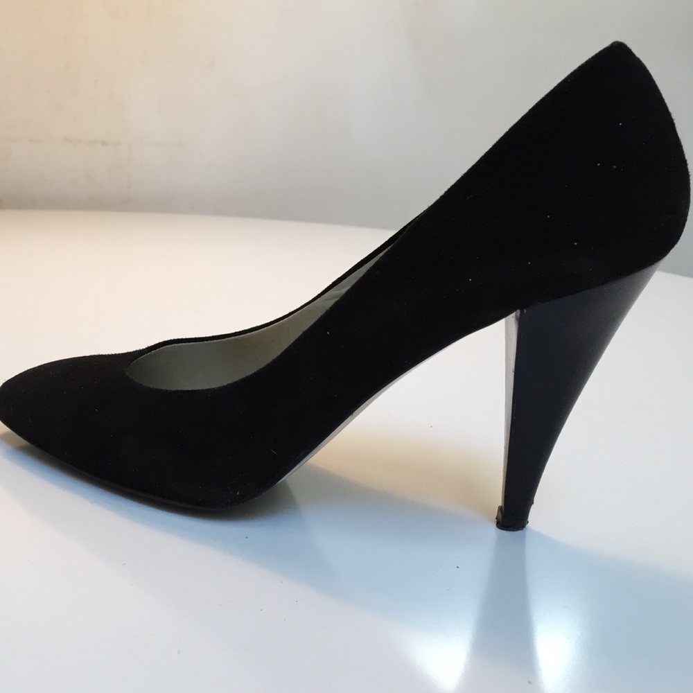 Black suede pumps with black leather 4 inch heel.