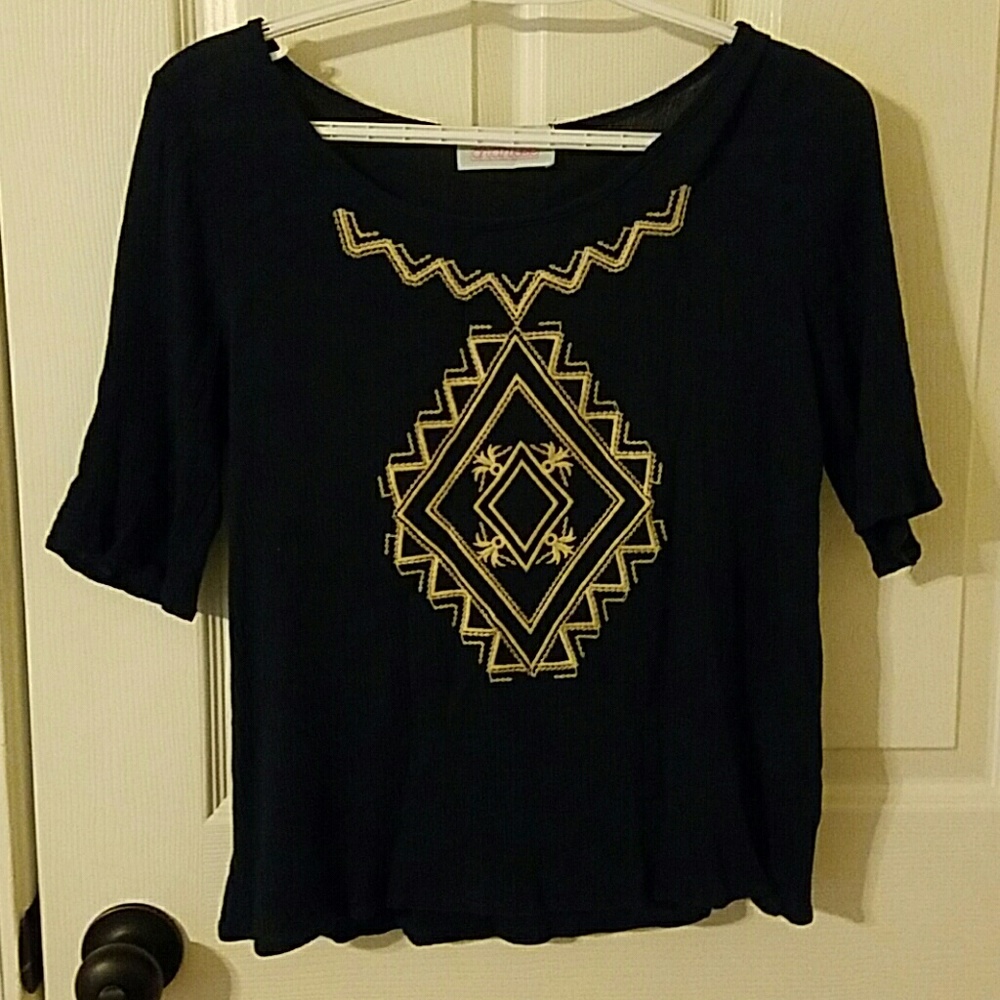 Navy top with beige design